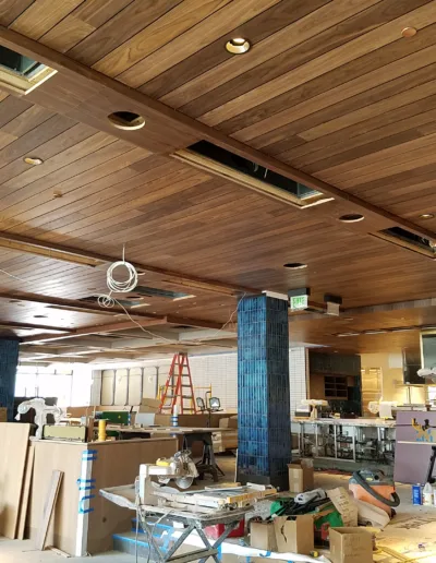 The ceiling of a restaurant is under construction.