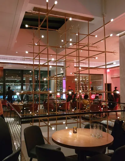 A restaurant with tables and chairs.